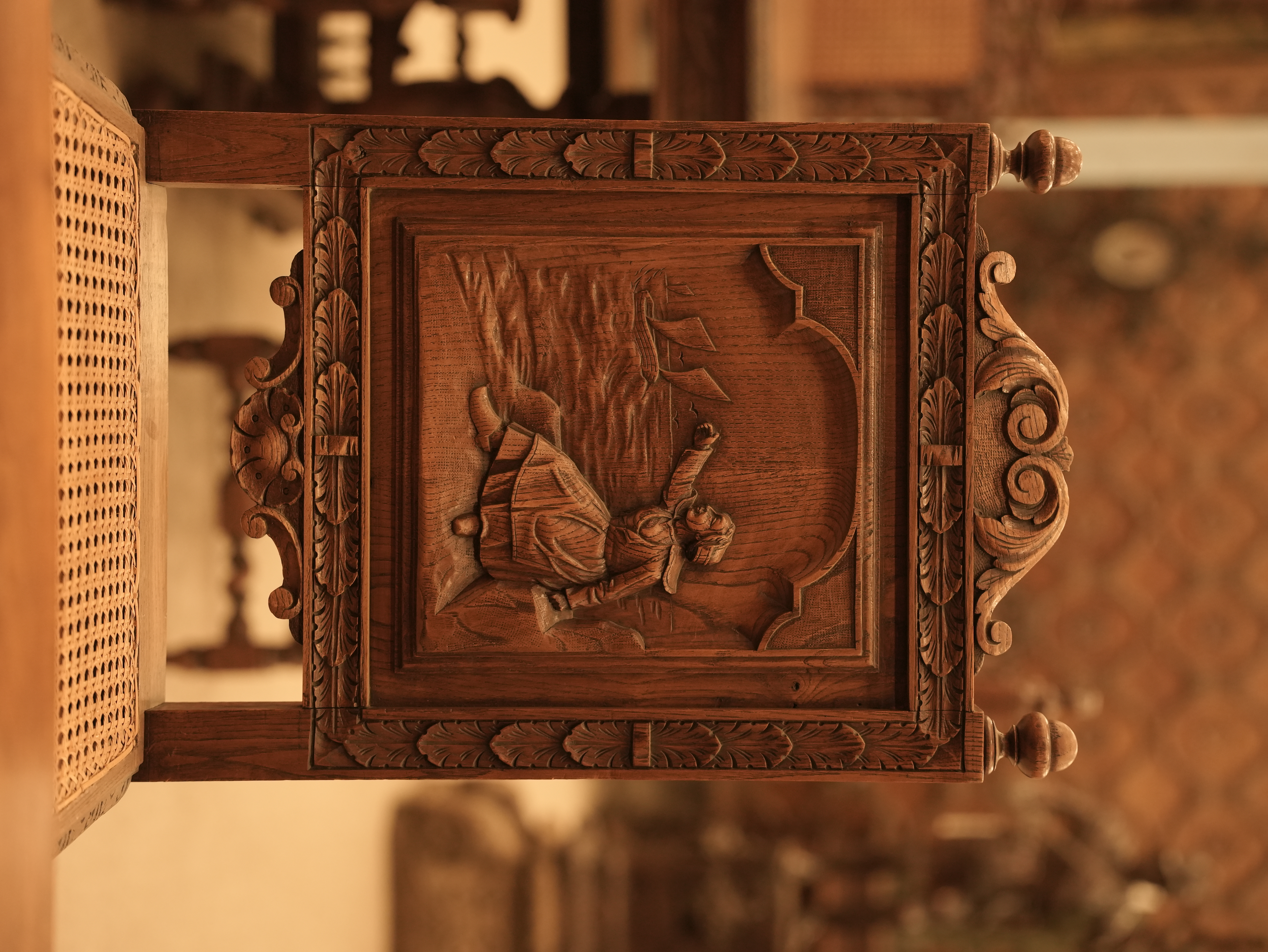 This is an antique Jacobean-style carved oak dining set.