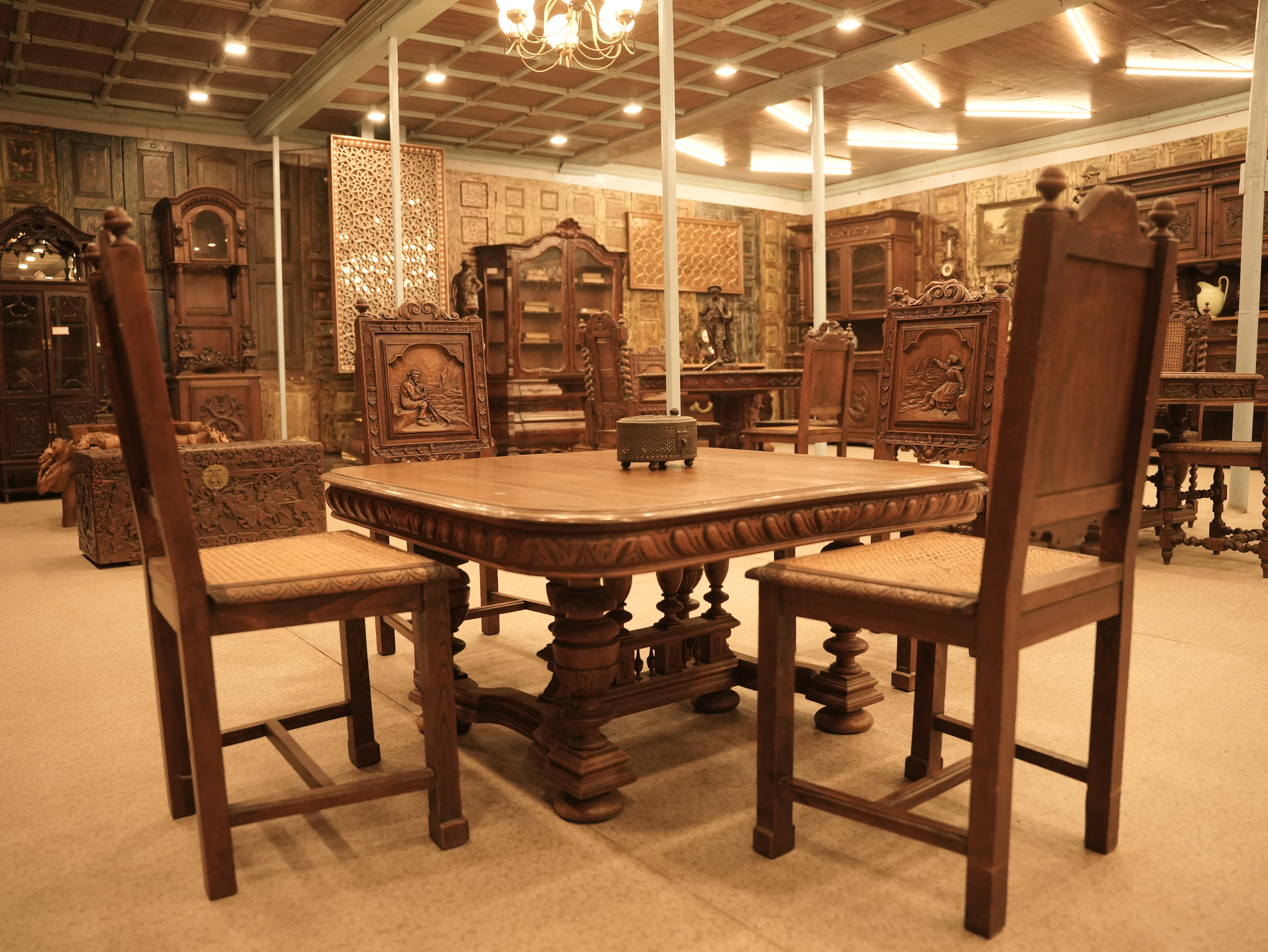 This is an antique Renaissance-style walnut buffet sideboard or cabinet.
