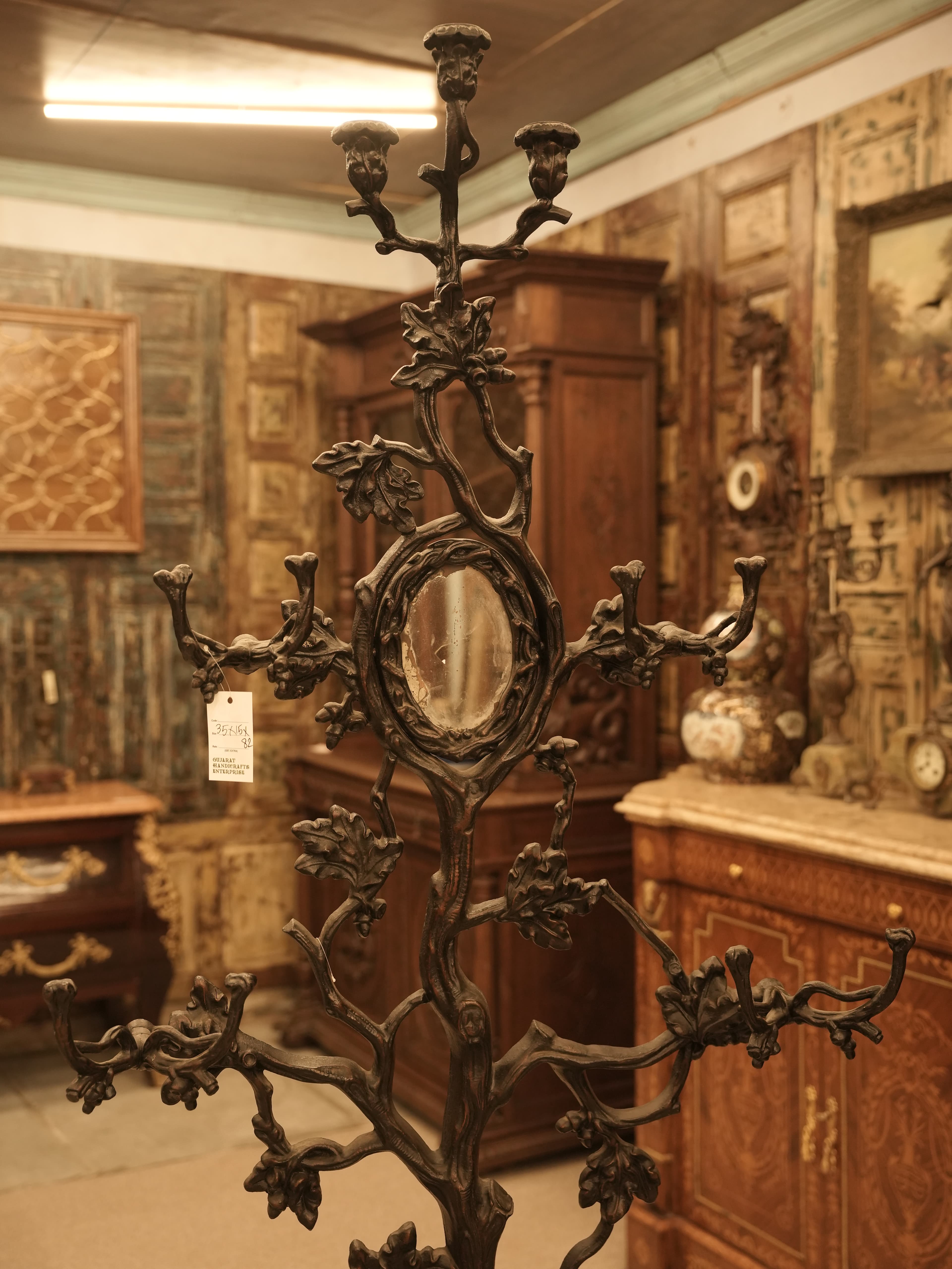 Teakwood geometric floral handcart design used in wall partition and ceiling.